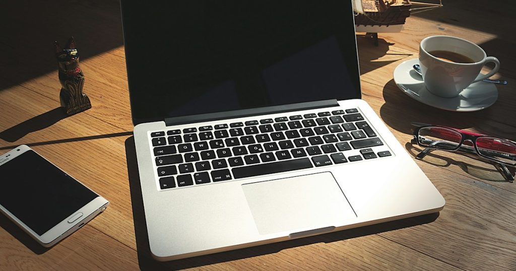 client onboarding process freelance workflow on a laptop